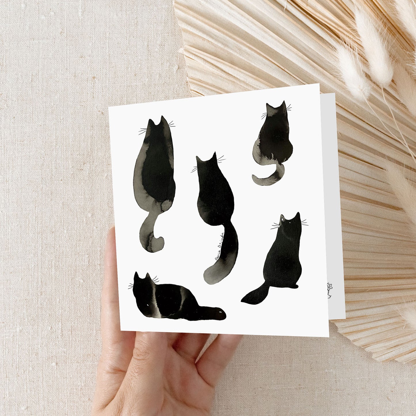 Carte de vœux carrée : élégantes silhouettes de chat à l'encre noire