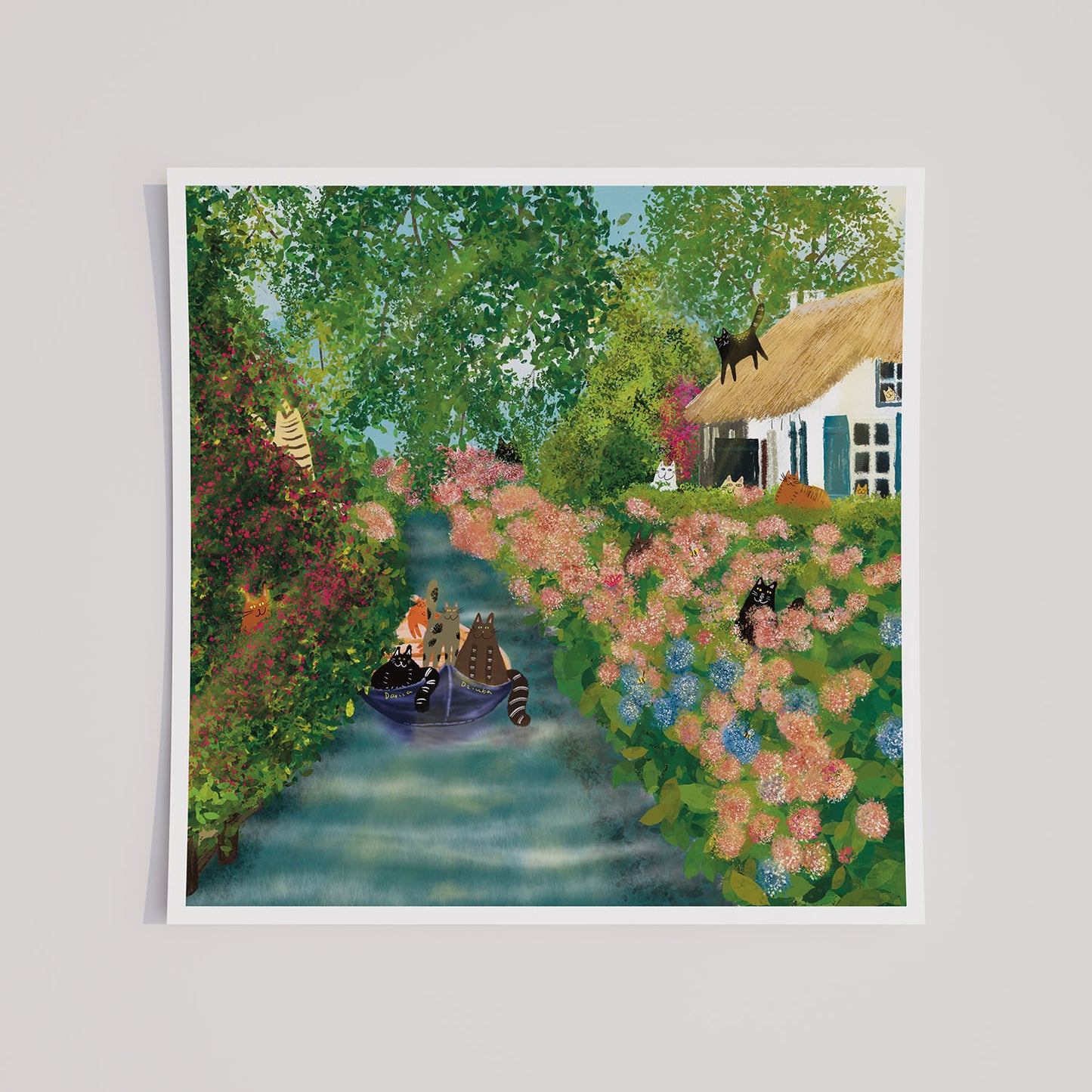 Impression d'art sans cadre de chats sur un canal dans un village chaleureux
