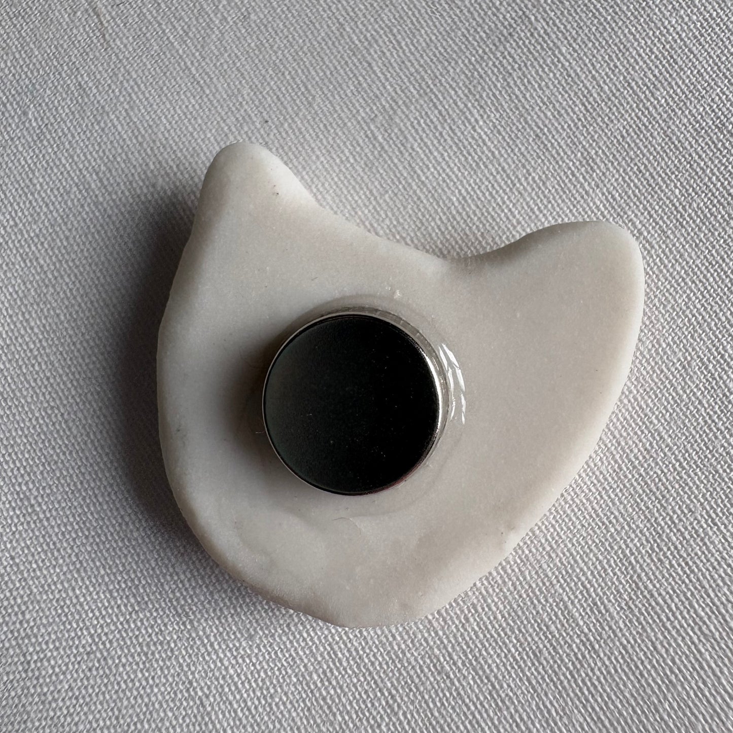 Tiny porcelain white kitty head magnets