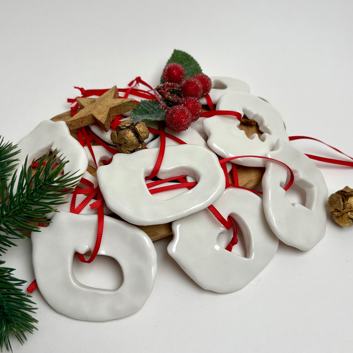 Handmade Porcelain Cat Christmas Ornament with Cutout, White Glazed Ceramic Holiday Decoration with Red Ribbon, Minimalist Winter Decor