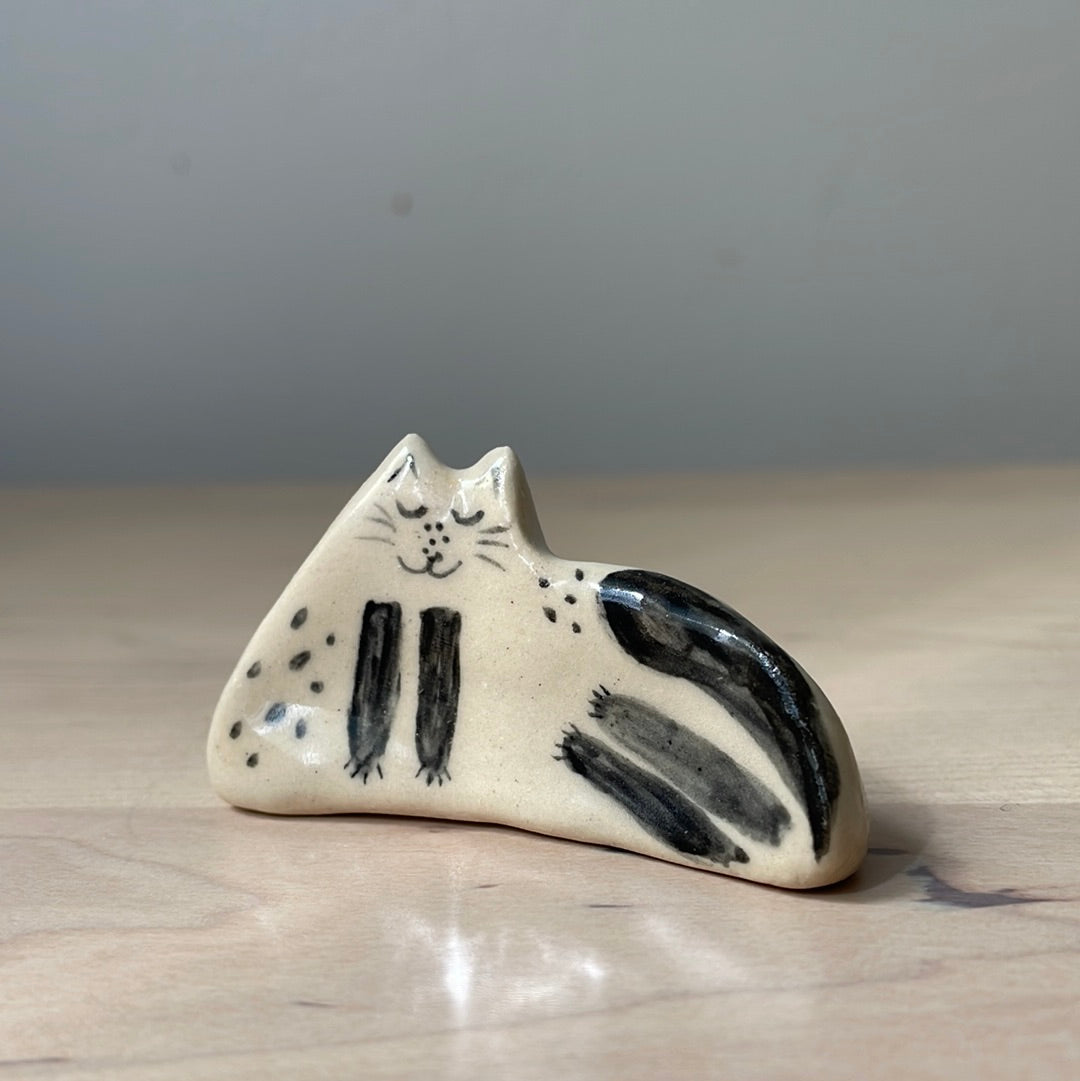 Happy black and white cat with black tail: Handmade ceramic cat figurine
