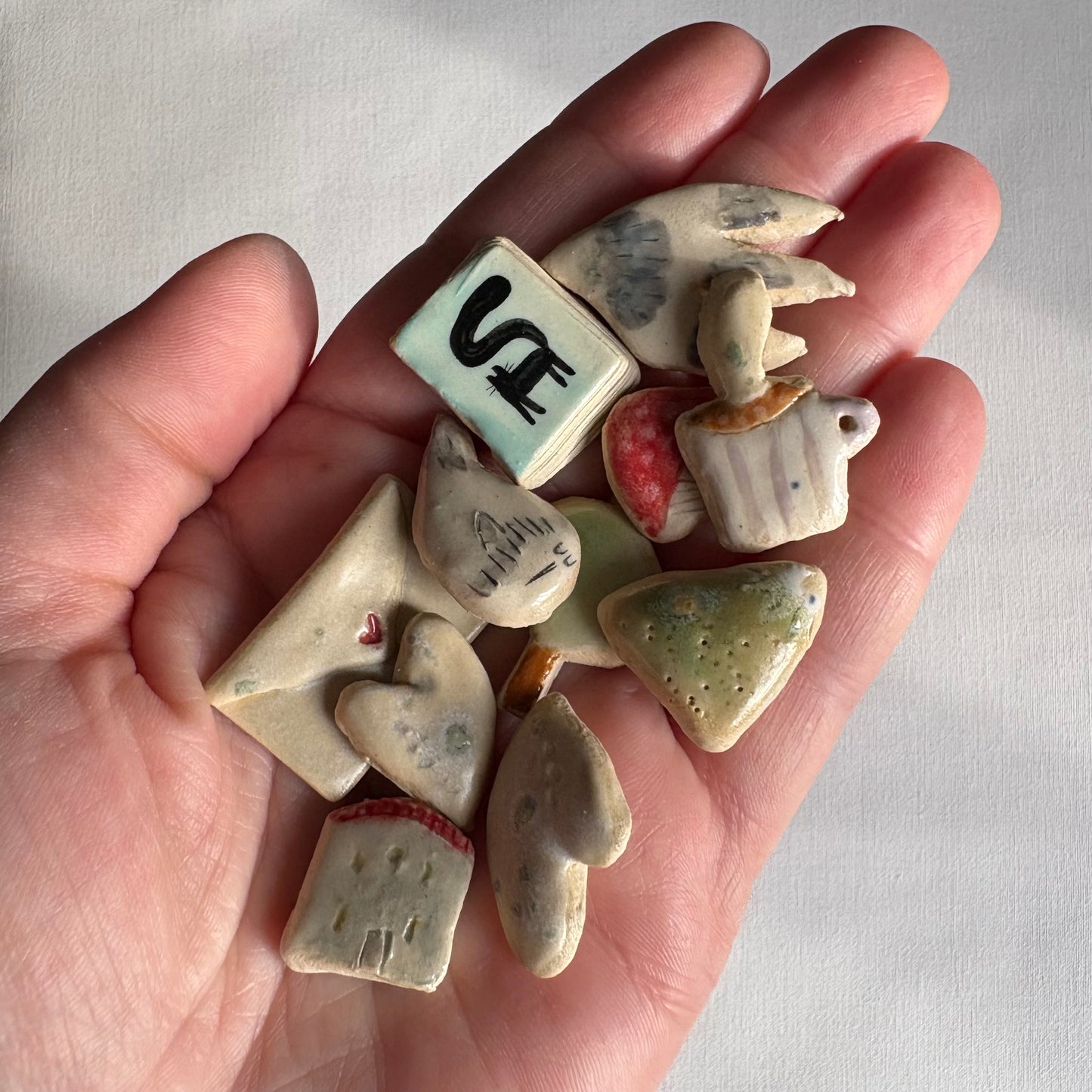 Tiny assorted ceramic magnets: Decorative