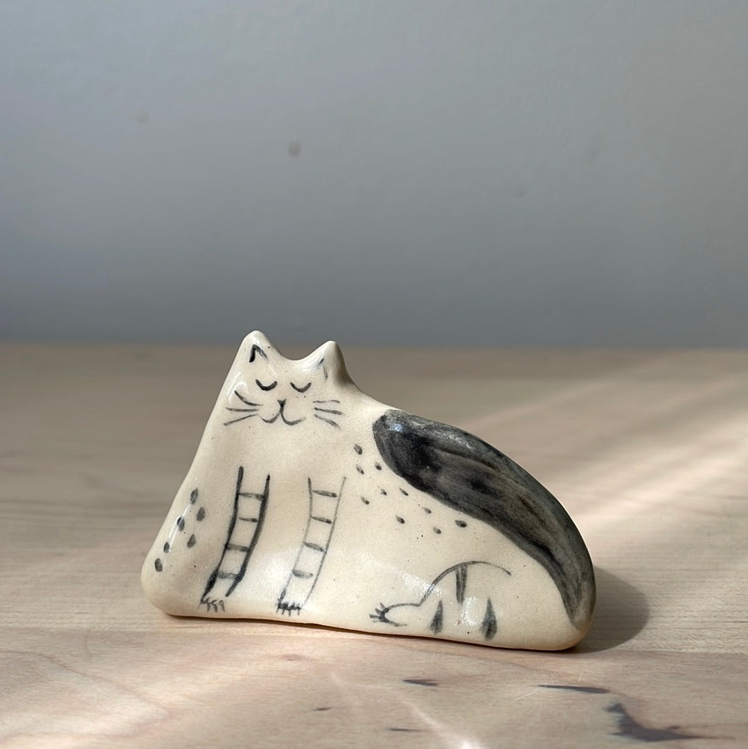 Black and white sitting kitty: Handmade ceramic cat figurine