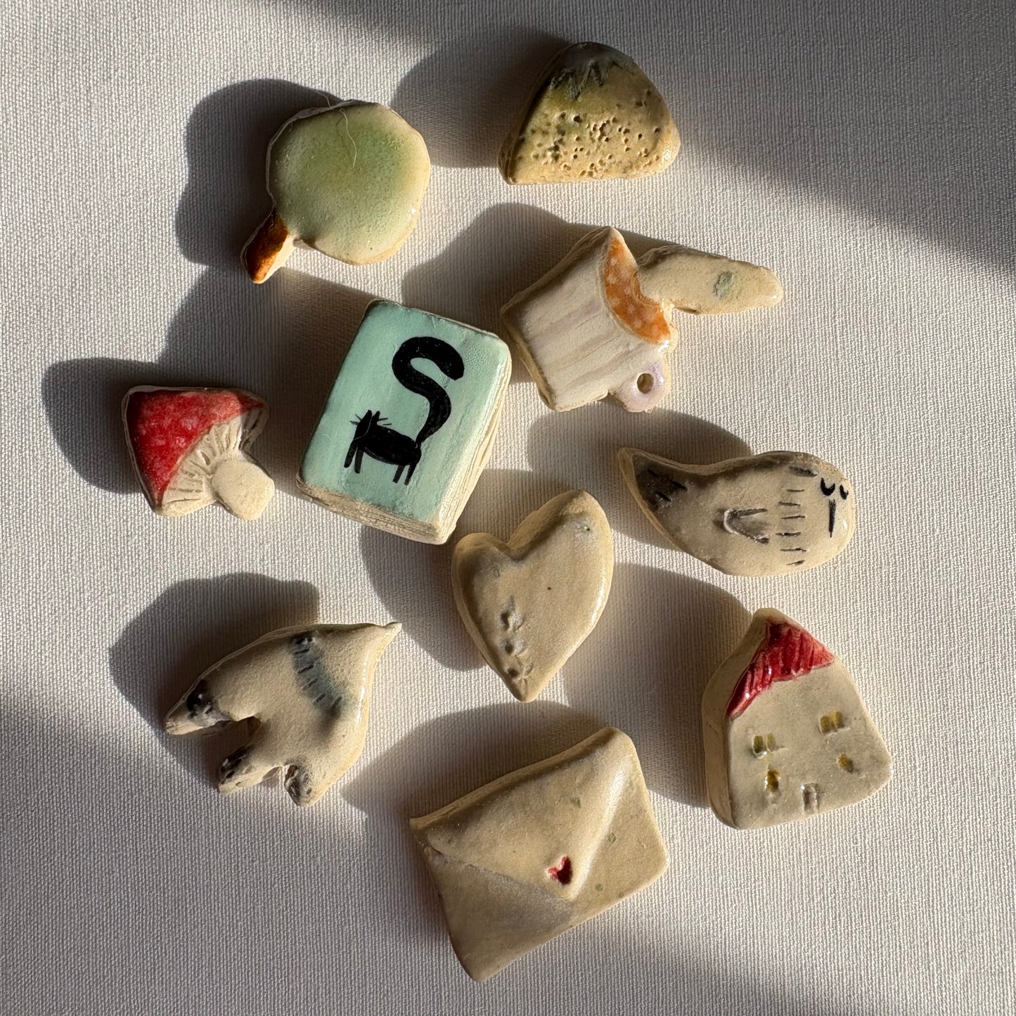 Tiny assorted ceramic magnets: Decorative