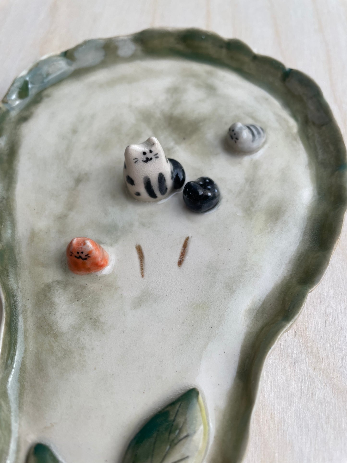 Ceramic trinket/ ring dish: Whimsical cat family in a pear dish