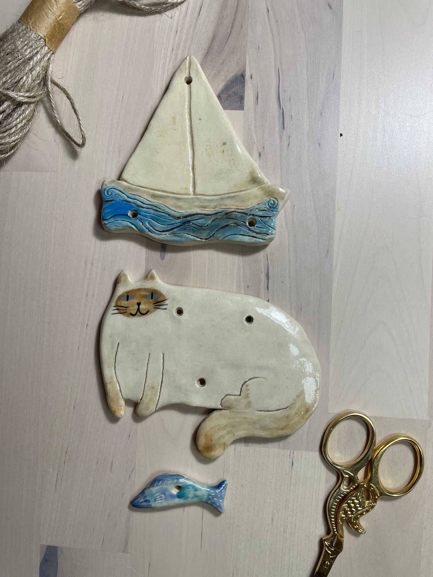 Ceramic cat themed garland: Cat, boat and fish