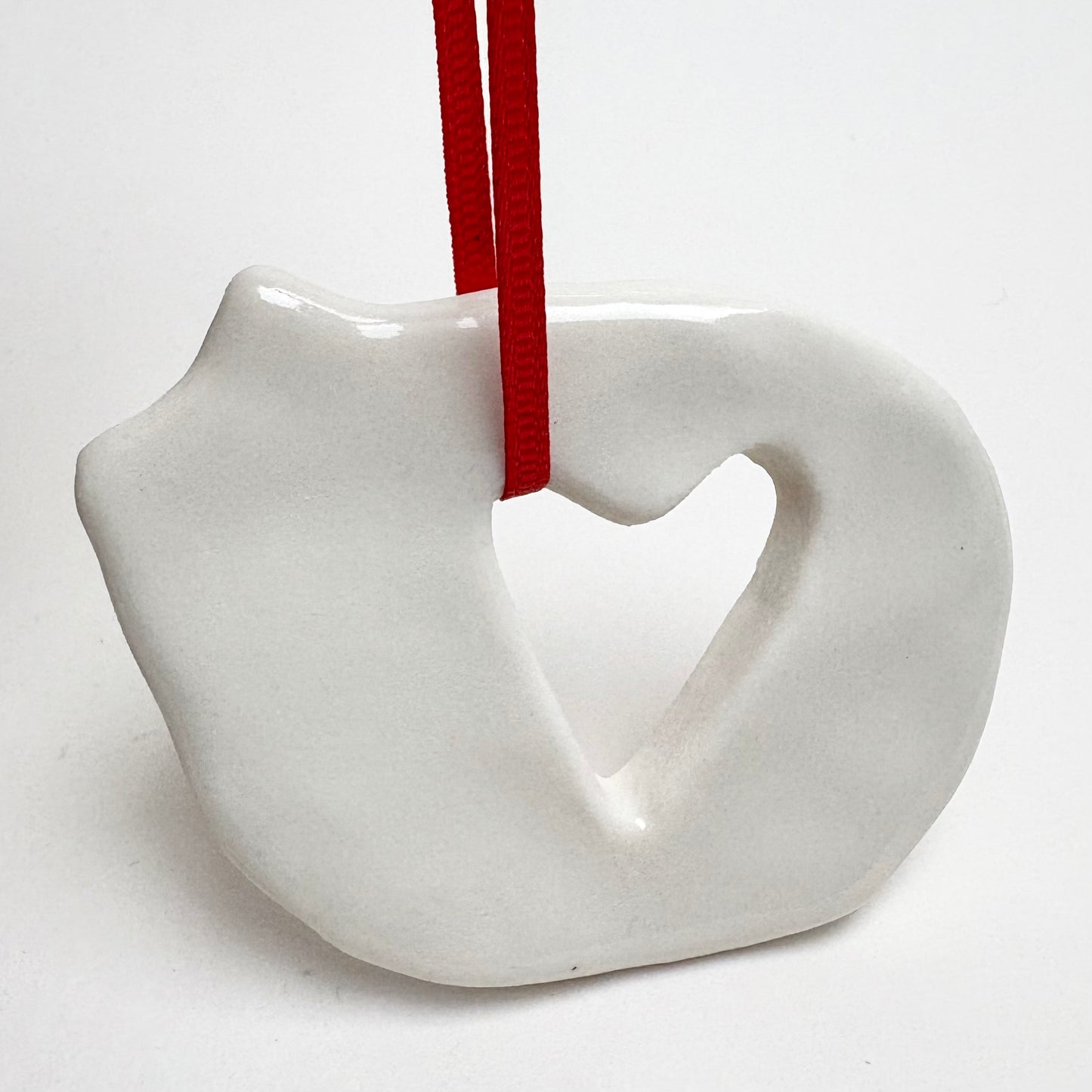 Handmade Porcelain Cat Christmas Ornament with Cutout, White Glazed Ceramic Holiday Decoration with Red Ribbon, Minimalist Winter Decor