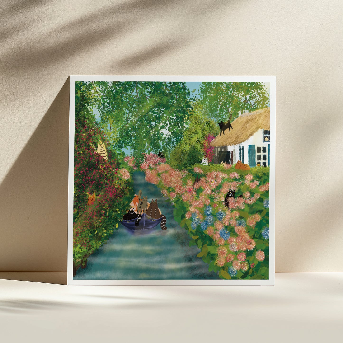 Cats on a Canal in a Cozy Village Unframed Art Print