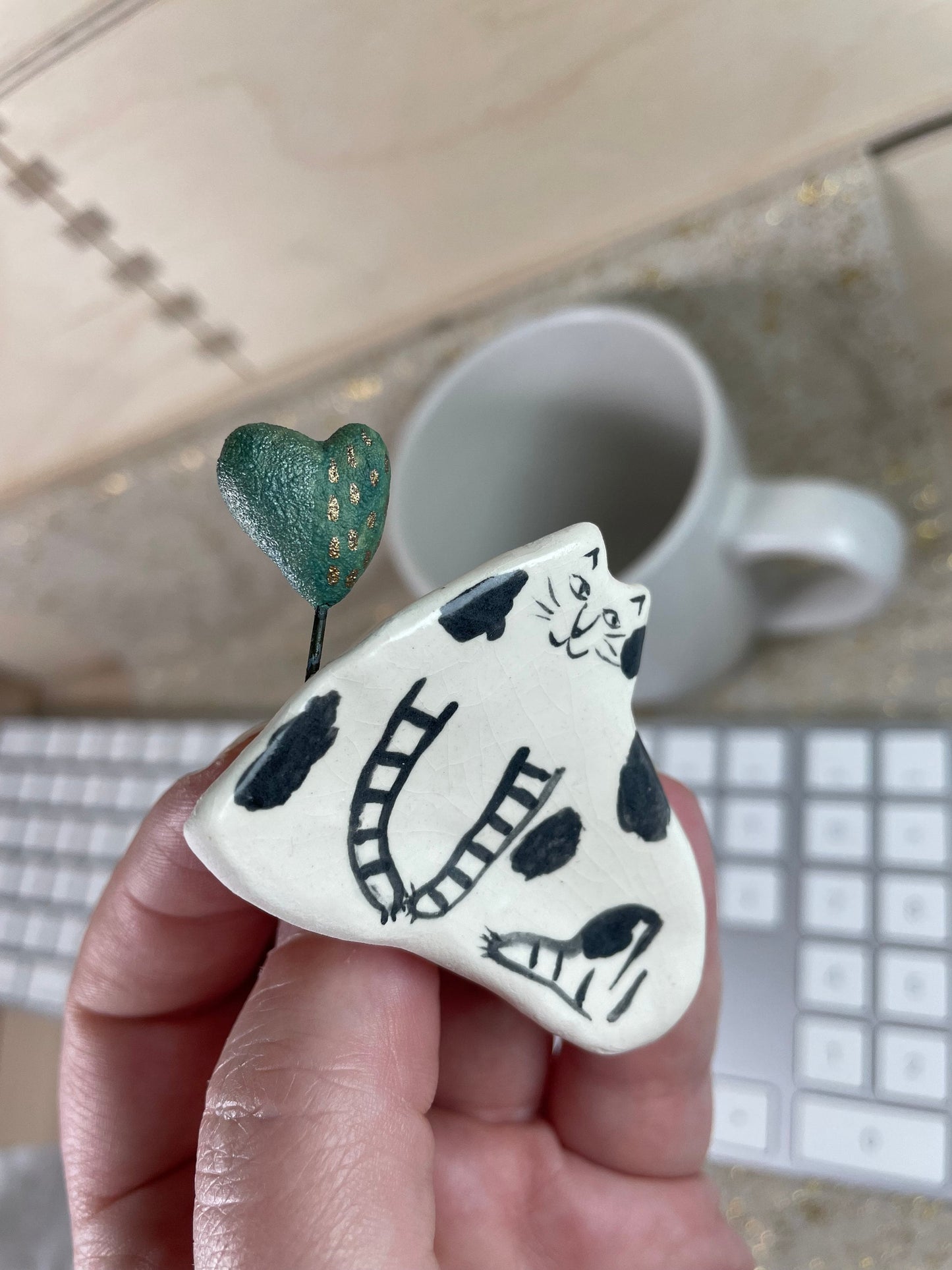 Cat and heart: Handmade ceramic cat figurine