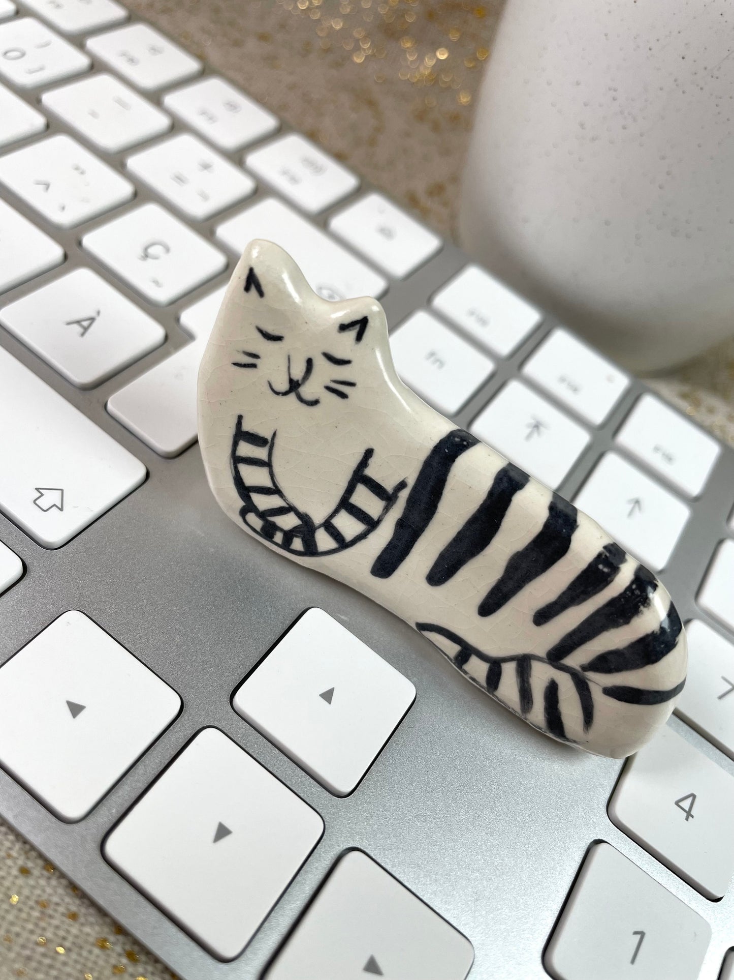 Cat with black stripes on the side: Handmade ceramic cat figurine