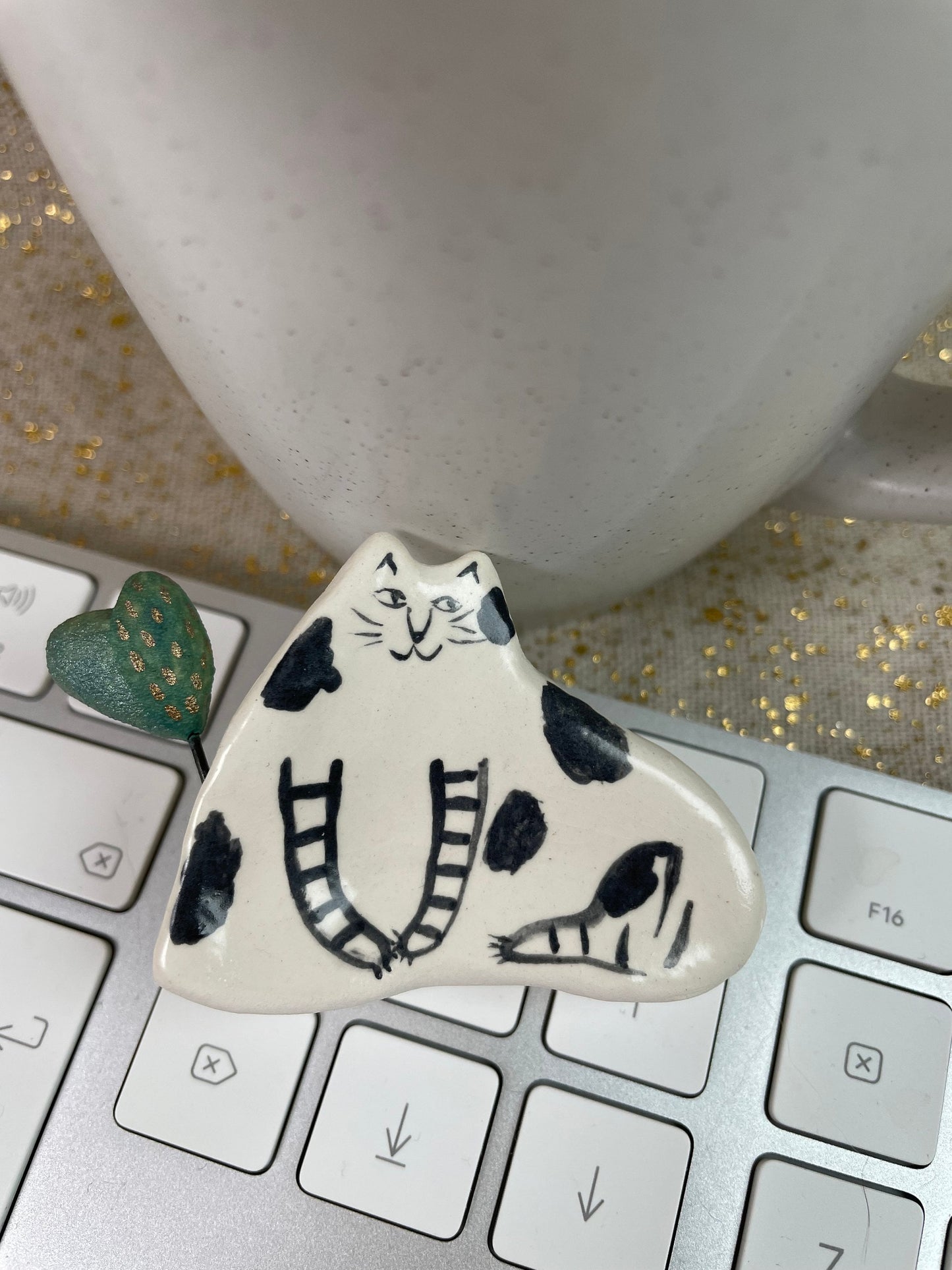 Cat and heart: Handmade ceramic cat figurine