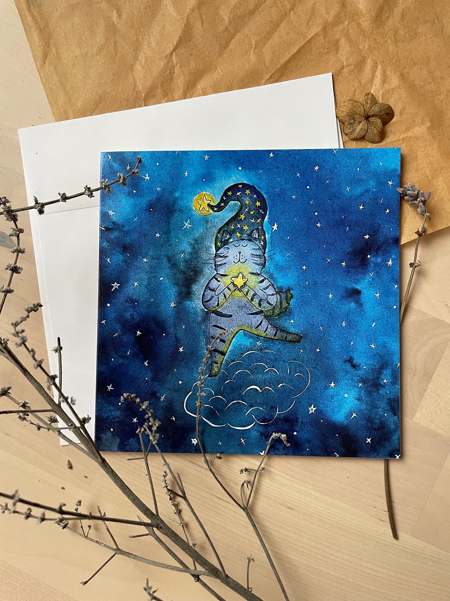 Cat holding a star on a cloud: Greeting card