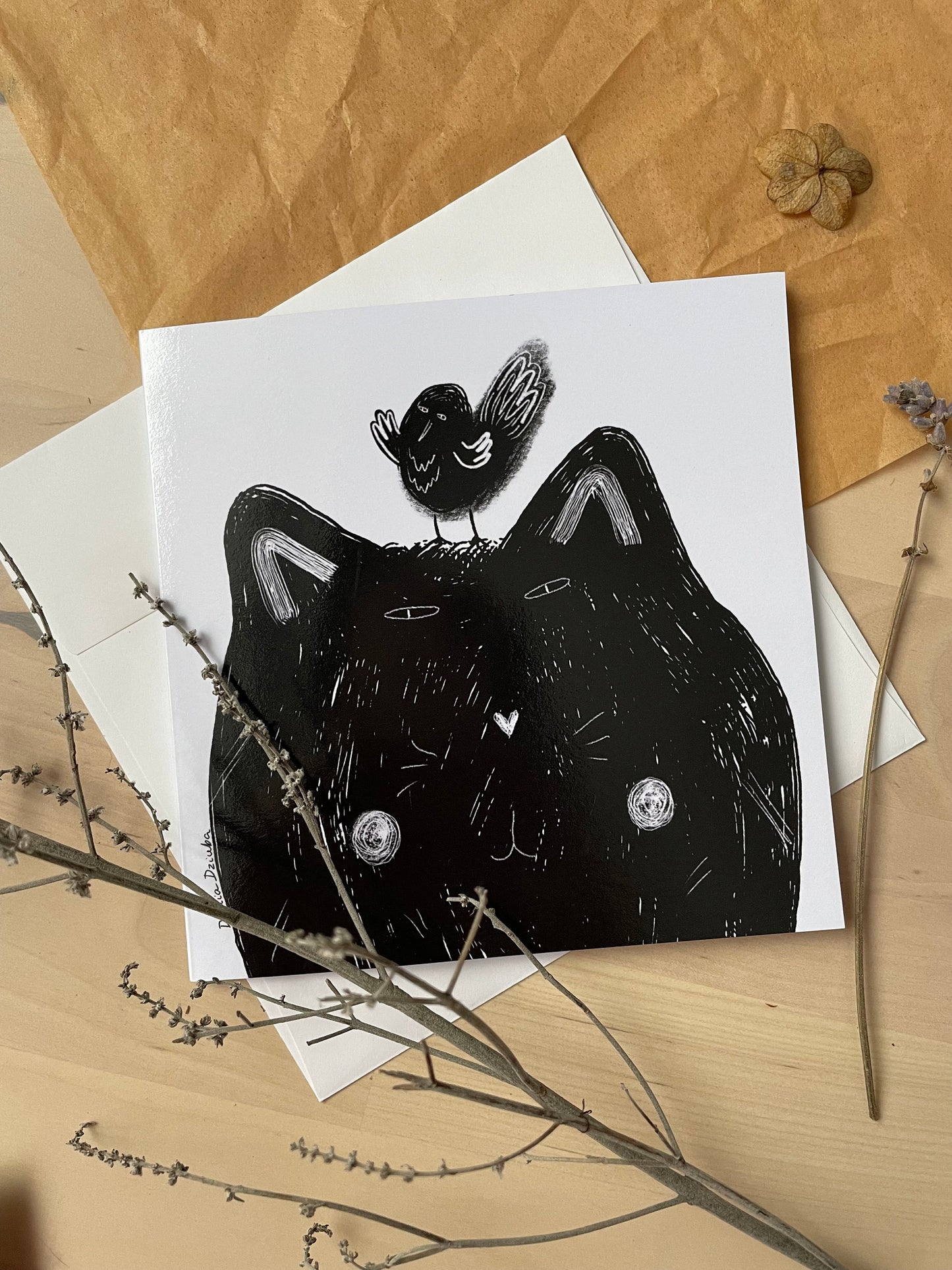 Black cat with black bird: Greeting card