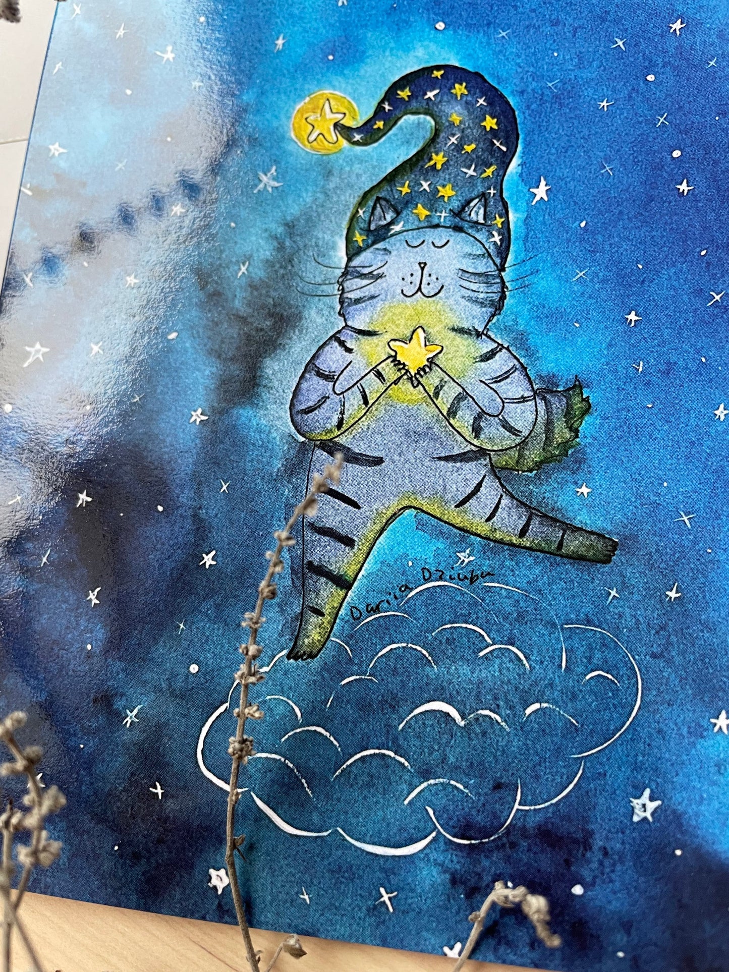 Cat holding a star on a cloud: Greeting card