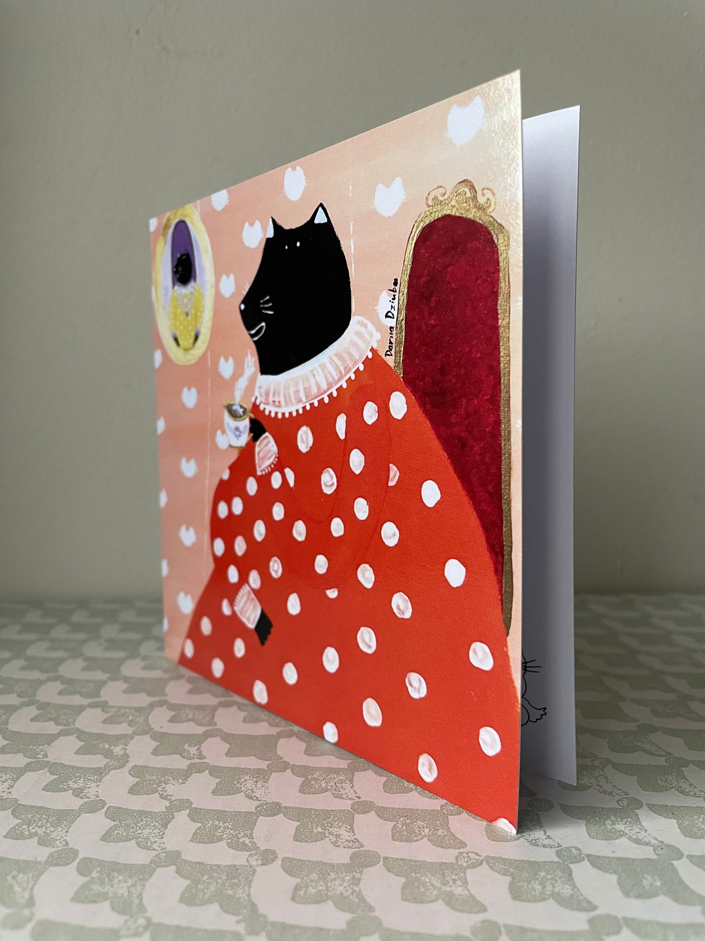 Black cat grandma drinking tea: Greeting card