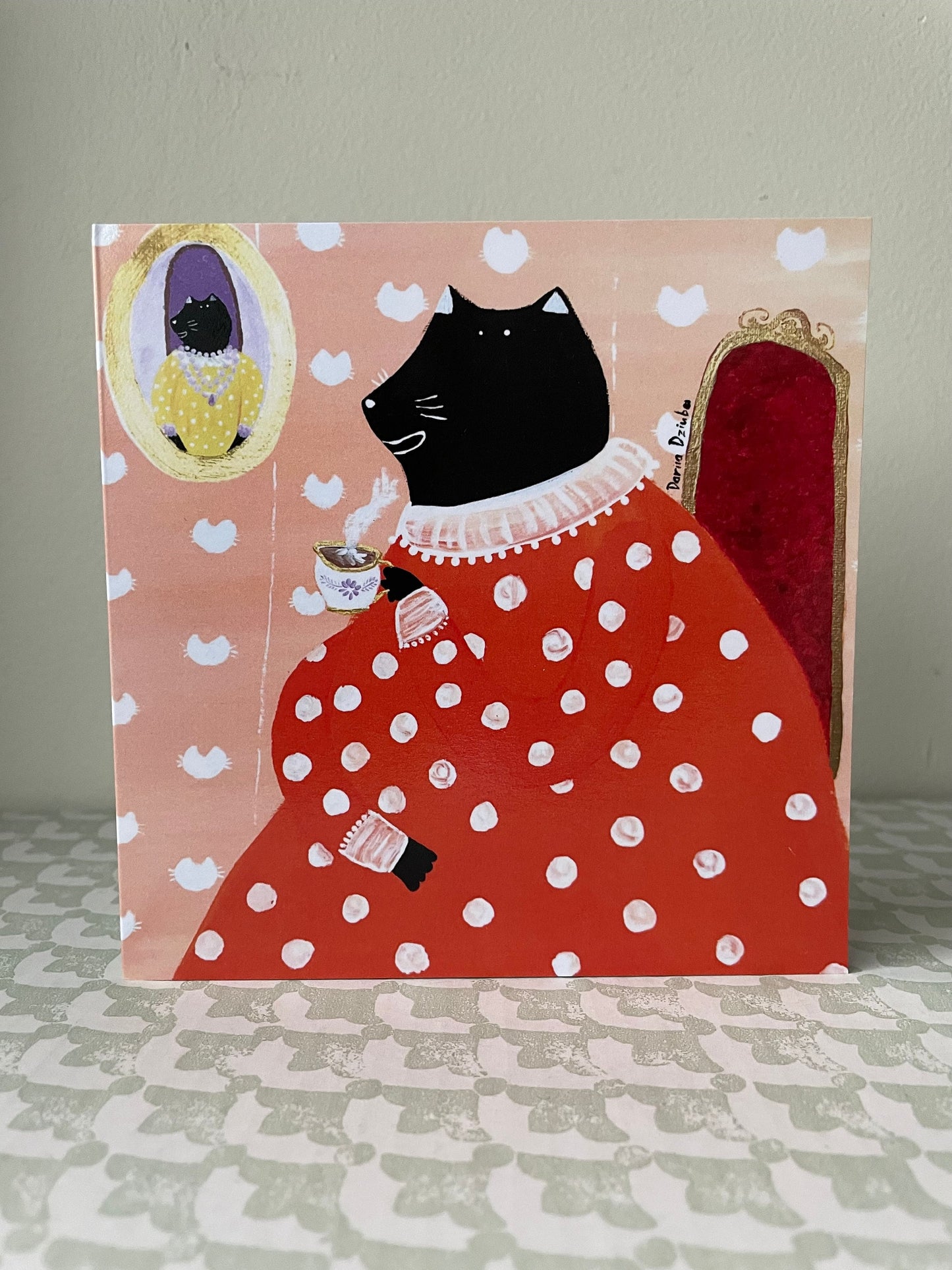 Black cat grandma drinking tea: Greeting card