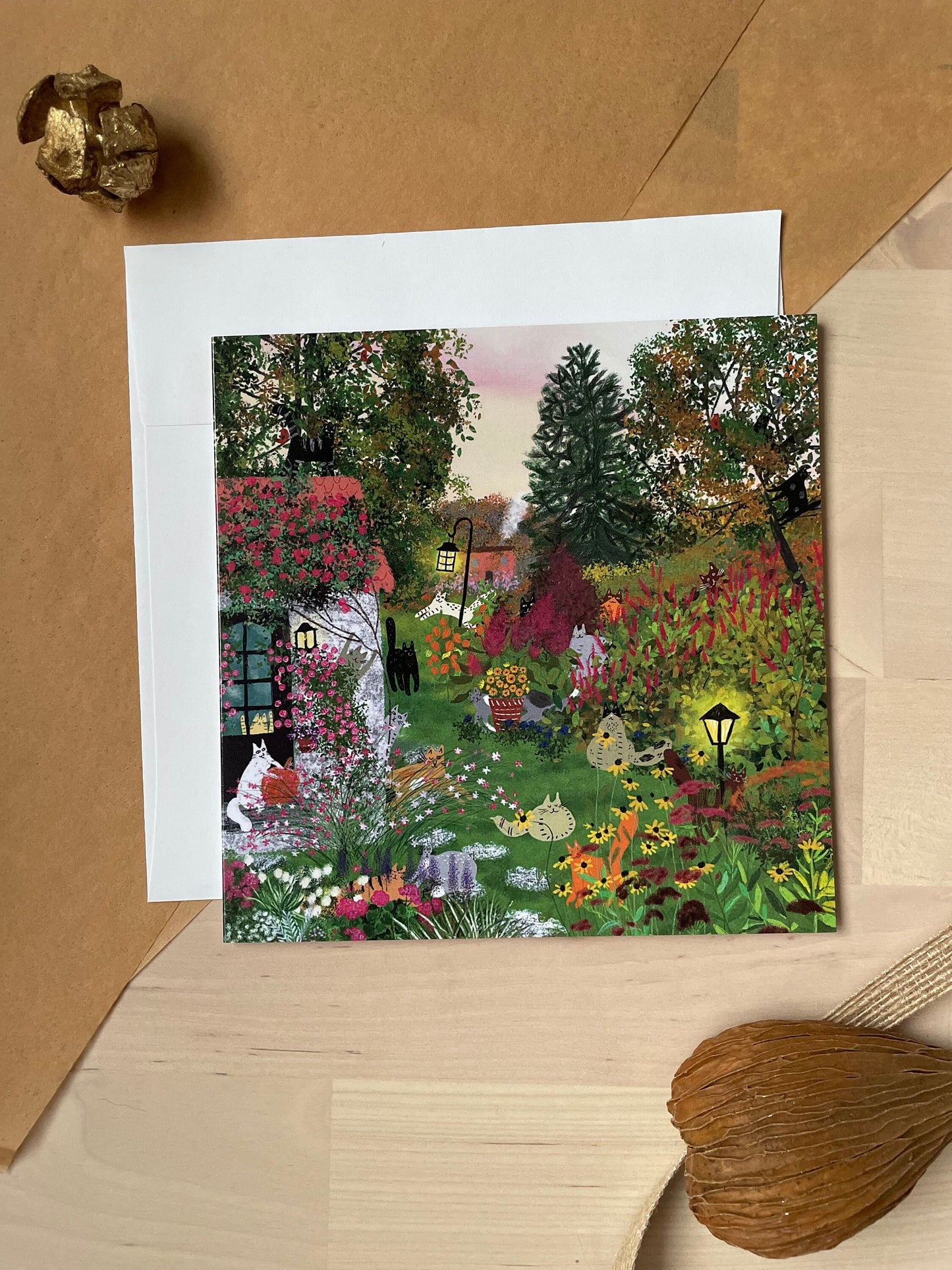 Cats in a fall garden: Greeting card